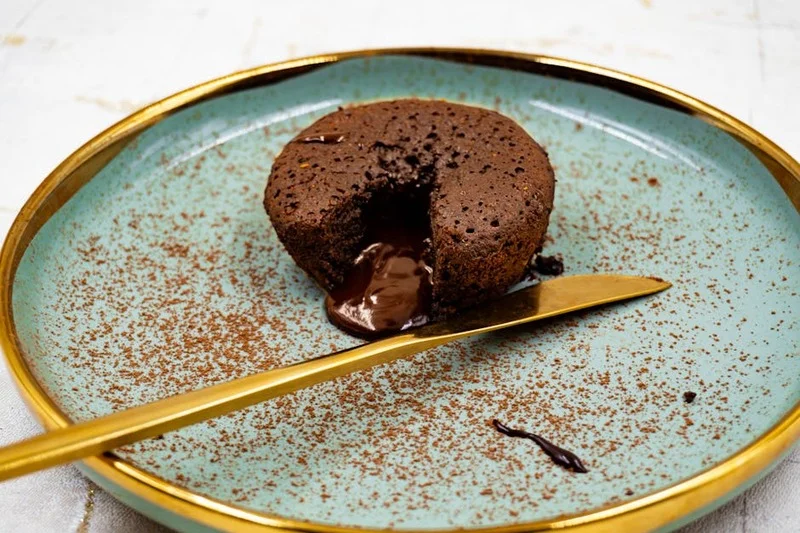 Chocolate lava cake with elderflower cream