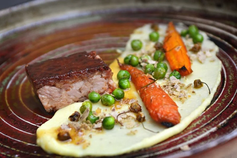 Main course Iberico pork cheek with vegetables